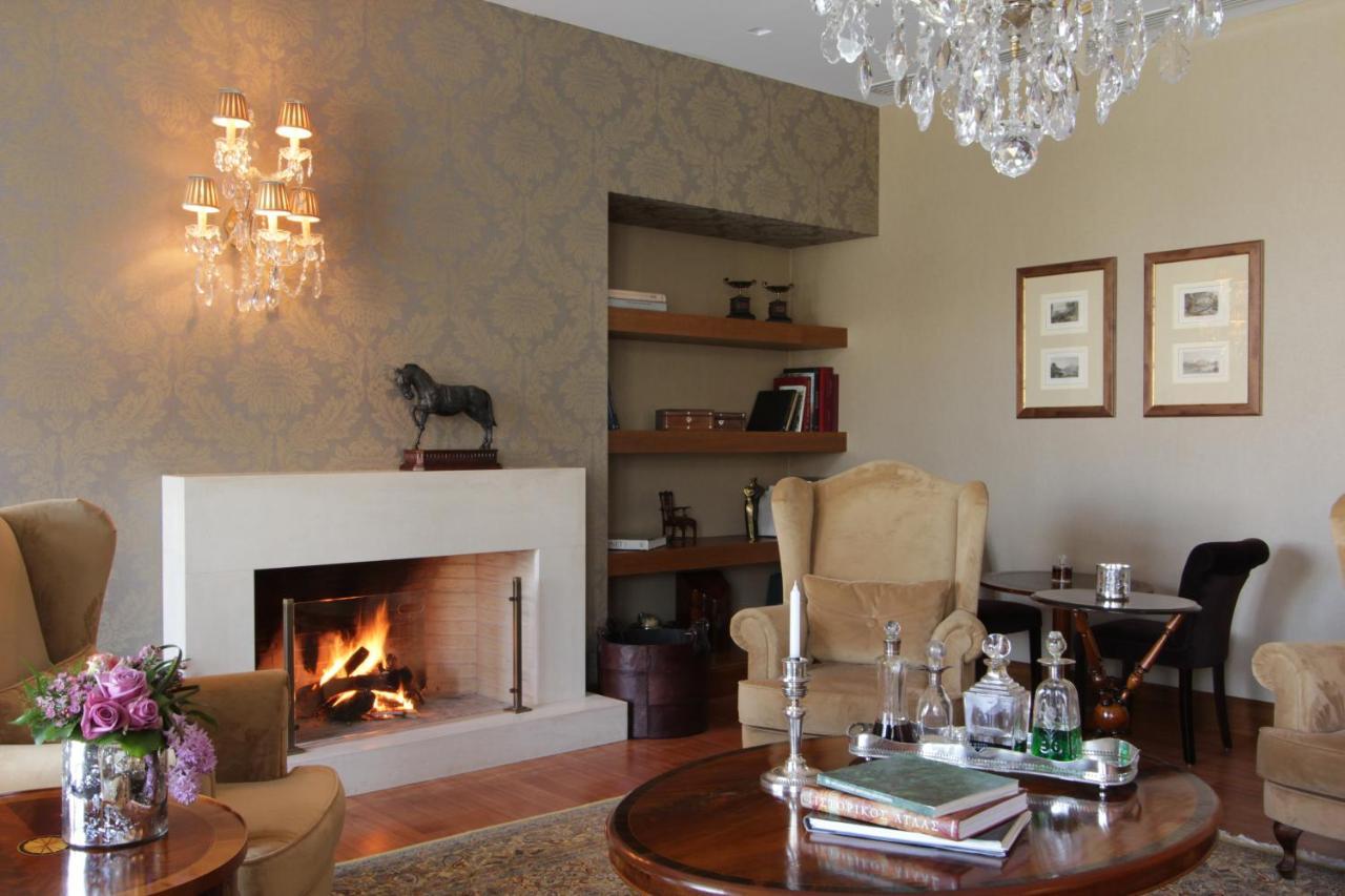 Hotel Du Lac Congress Center & Spa Янина Экстерьер фото A fireplace in a living room